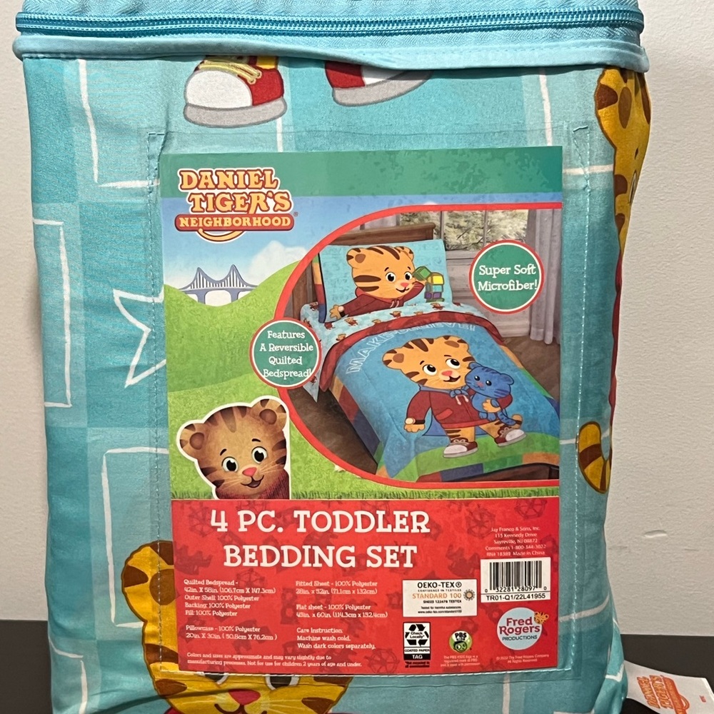 Daniel Tiger 4pc.toddler bedding set. Brand new. Sold out online and in stores.